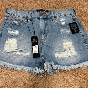 Fashion Nova Light Blue Ripped Jean Shorts